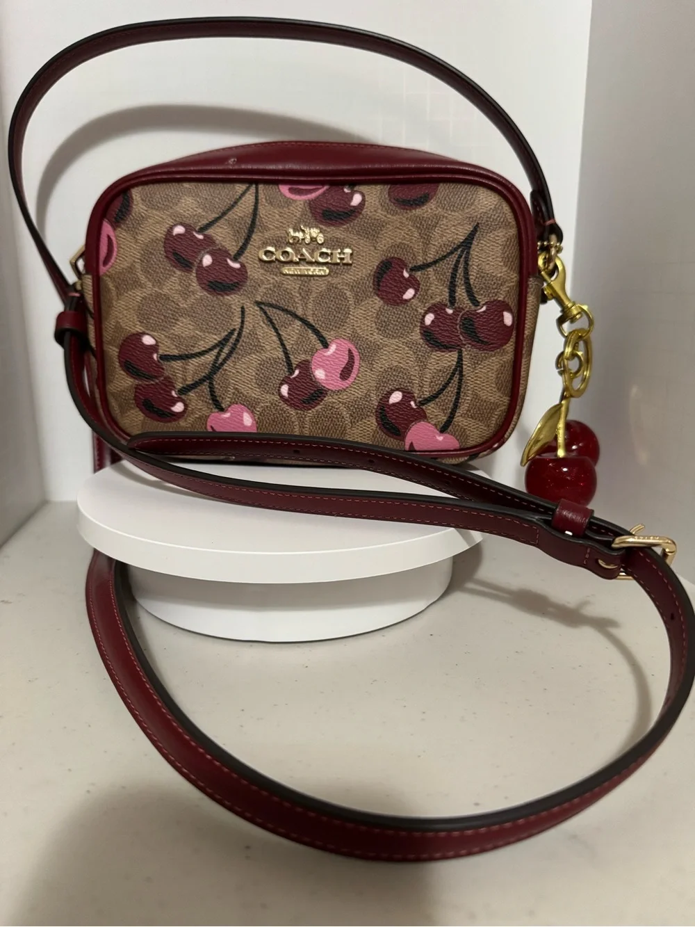 Coach Cherry Print Crossbody Bag in Brown and Burgundy